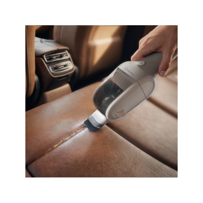 The small dusting brush gently cleans uneven or delicate surfaces, such as crevices in cars.