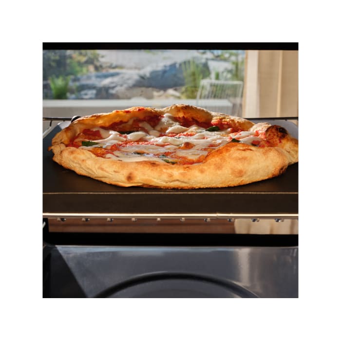 A neapolitan pizza baking inside the pizza expert oven 